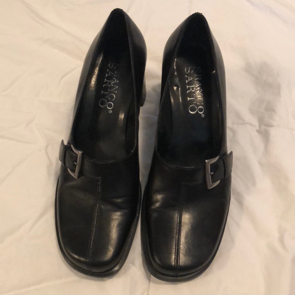 Black leather closed toe heels